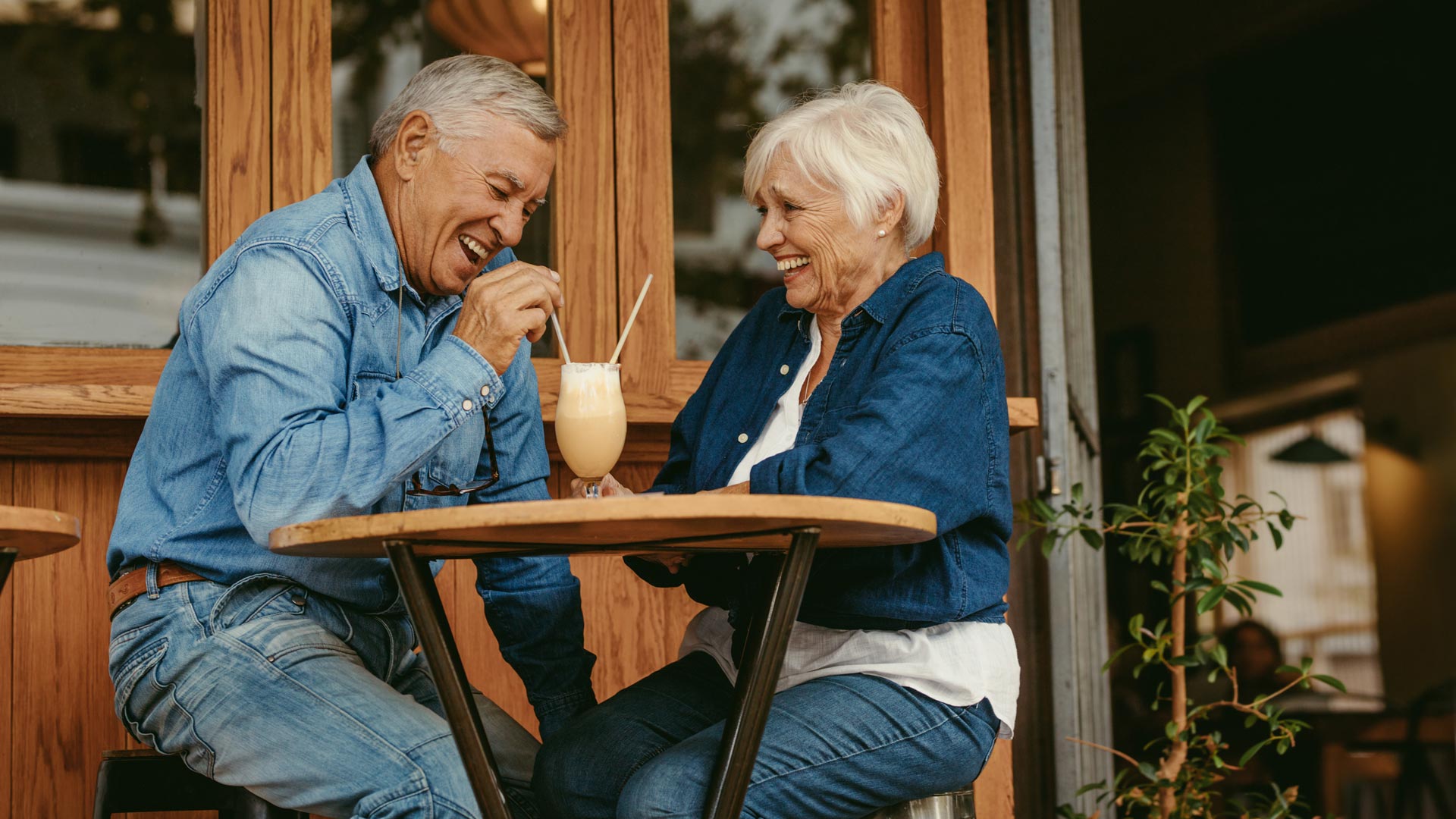 Senior couple having great time at cafe
