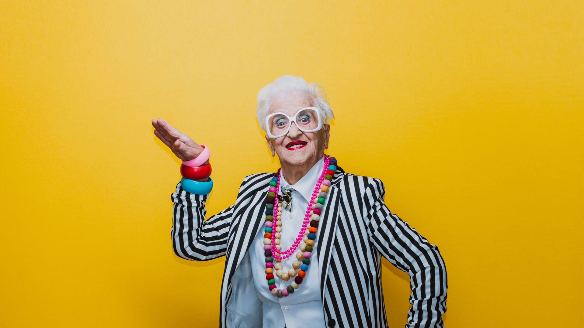 Funny grandmother portraits. Senior old woman dressing elegant f